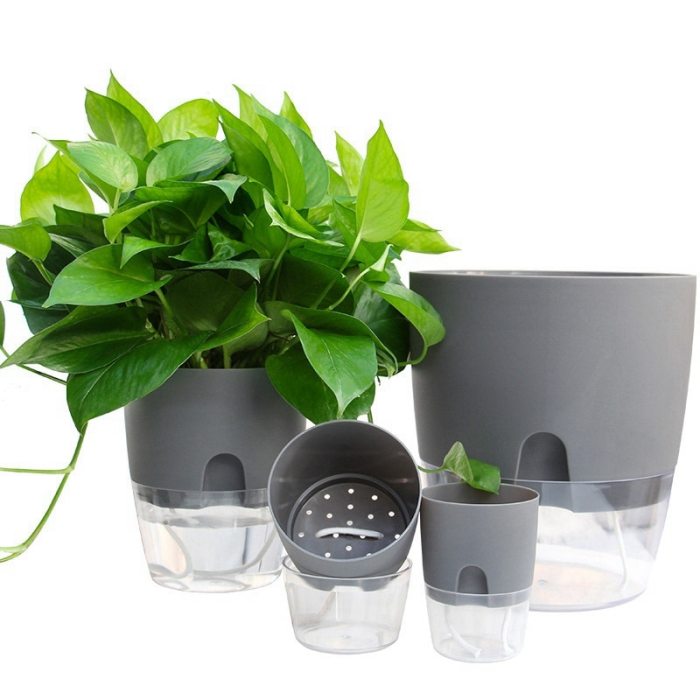 Self-watering indoor plant pots